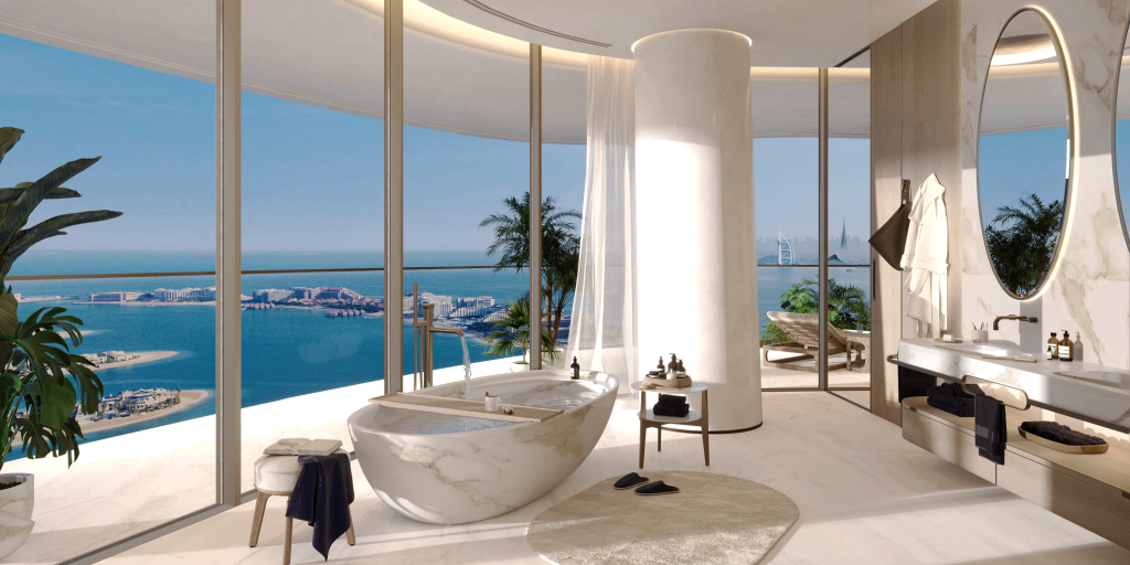 Luxury bathroom in Como Residences with marble finishes and a freestanding bathtub.