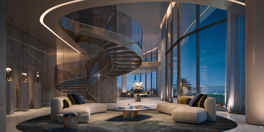 Modern staircase with glass railings connecting the duplex levels at Como Residences.